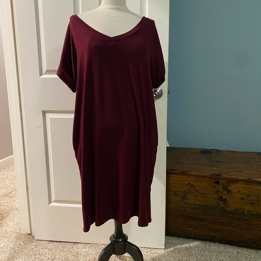 Cute knee length maroon dress with cuffed short sleeves